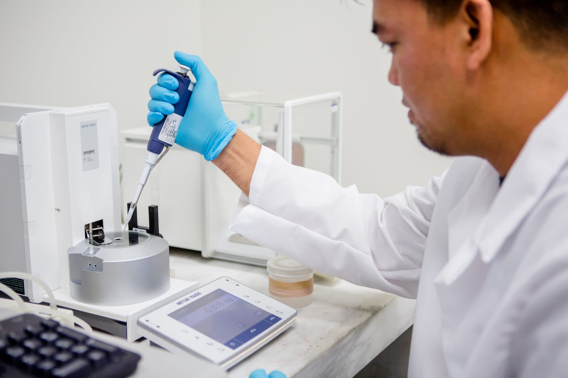 Gravimetric pipette calibration on an analytical balance in the American Gage pipette laboratory